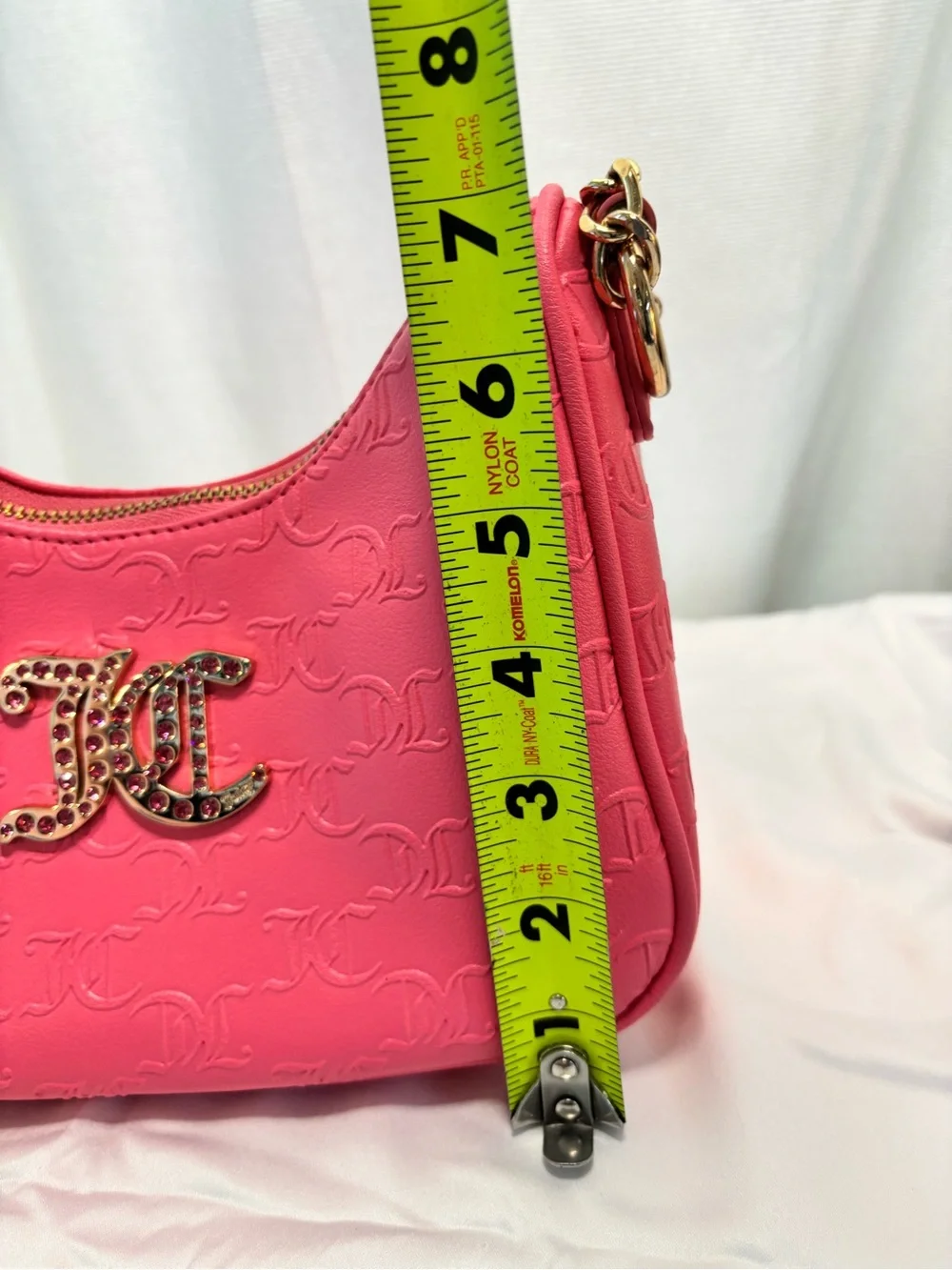 Juicy Couture Embossed hobo Bag with Gold Hardware and Crystal JC Logo